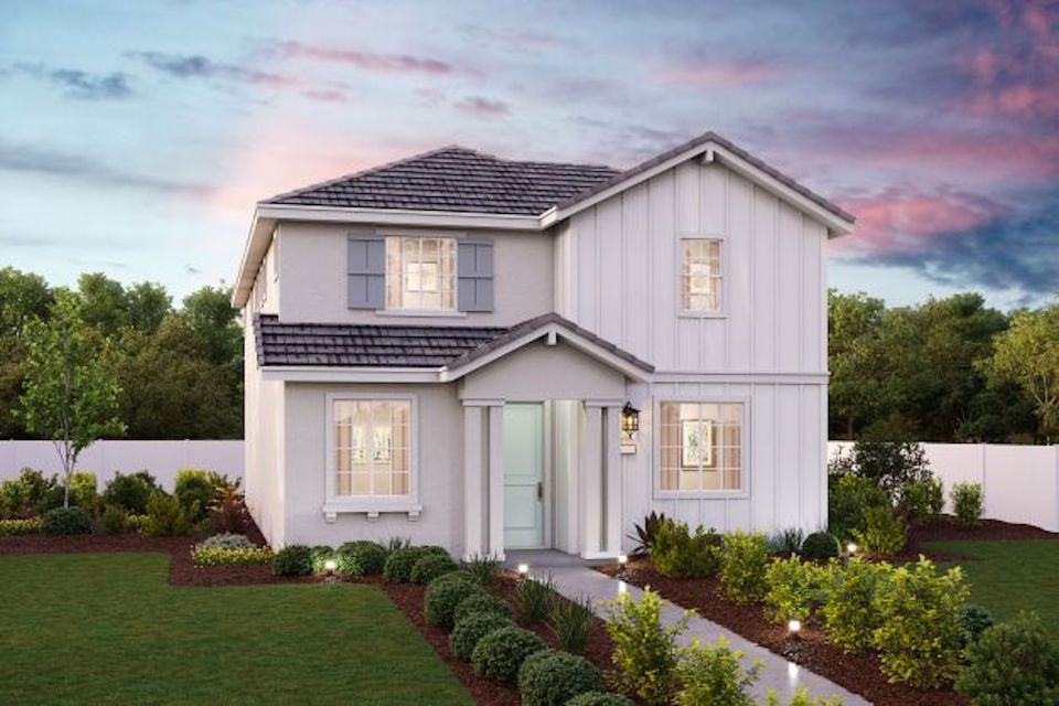 A house with a large front yard.