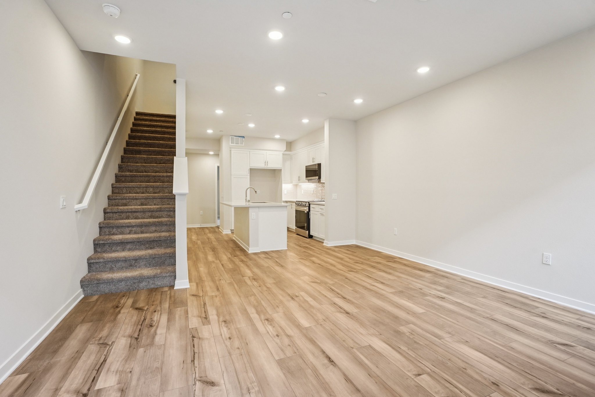 A large empty room with white walls.