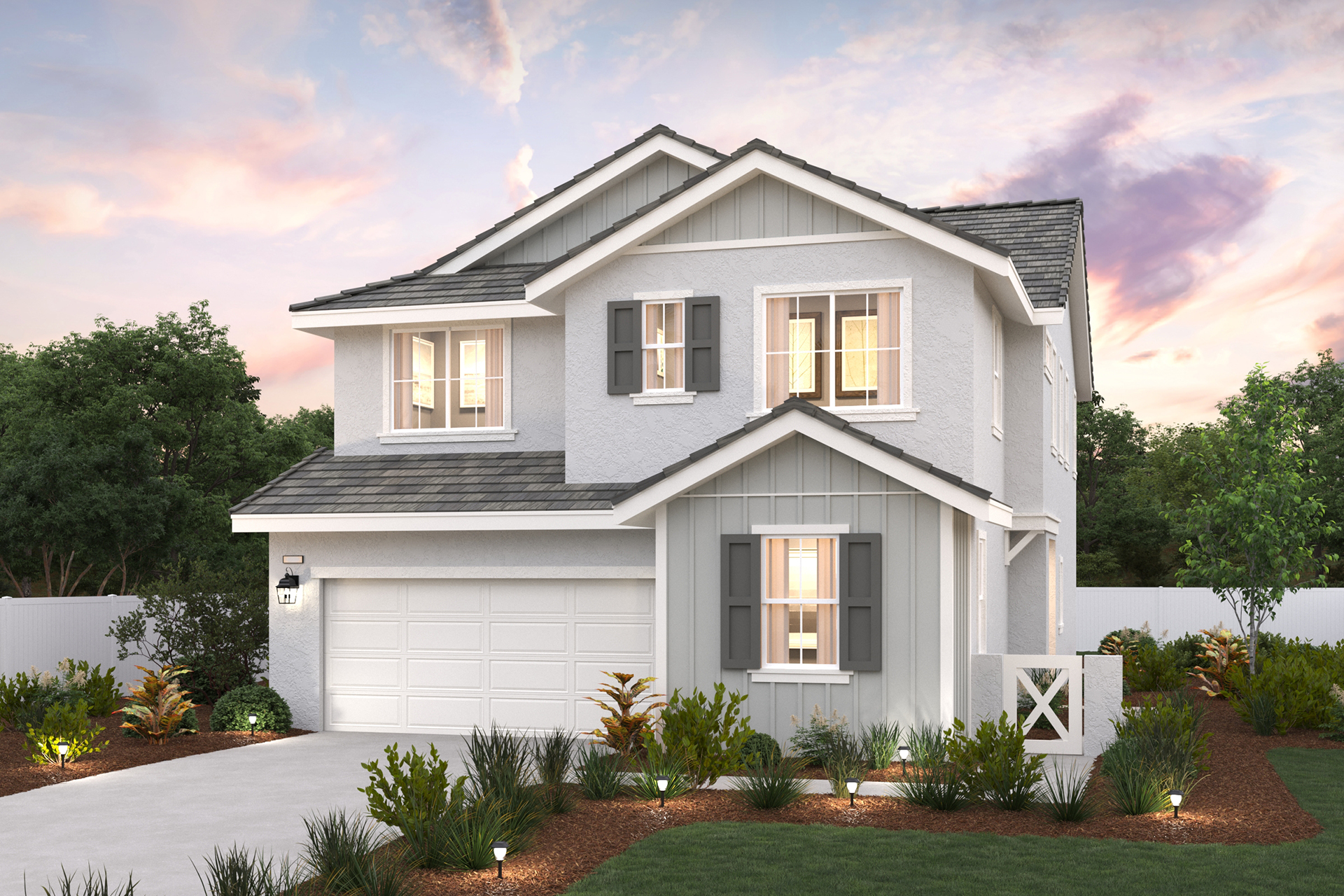 A white house with a driveway.