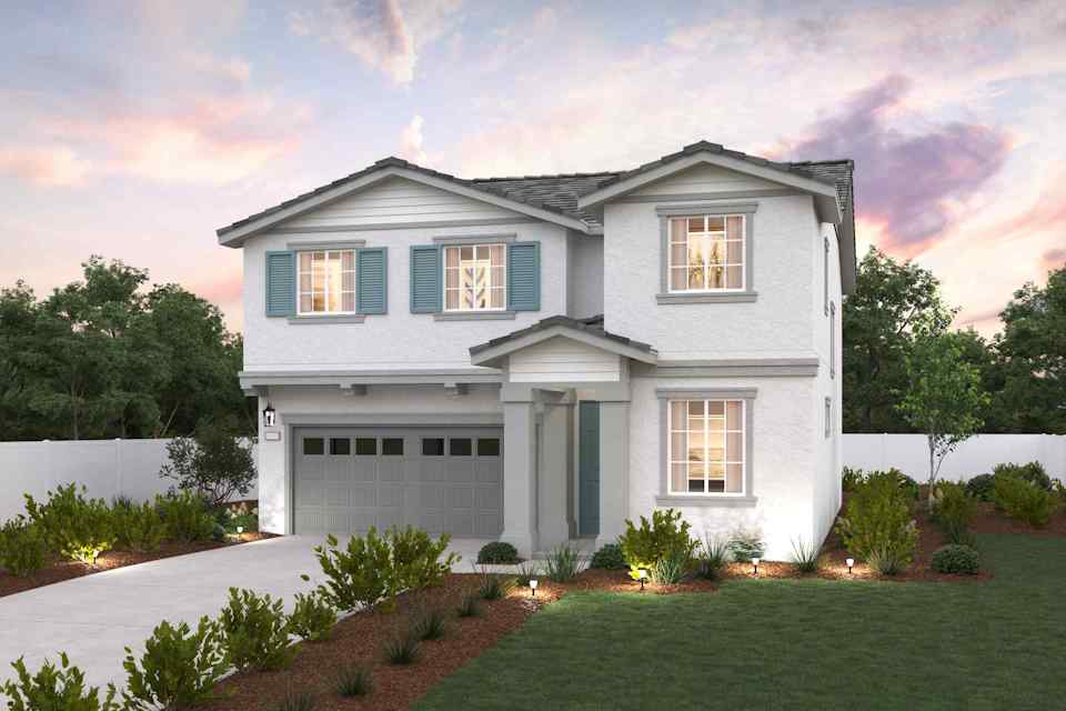 A white house with blue shutters.