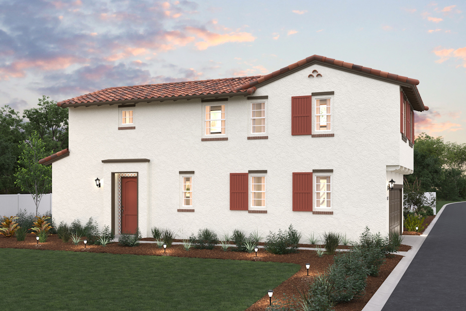 A white house with red shutters.