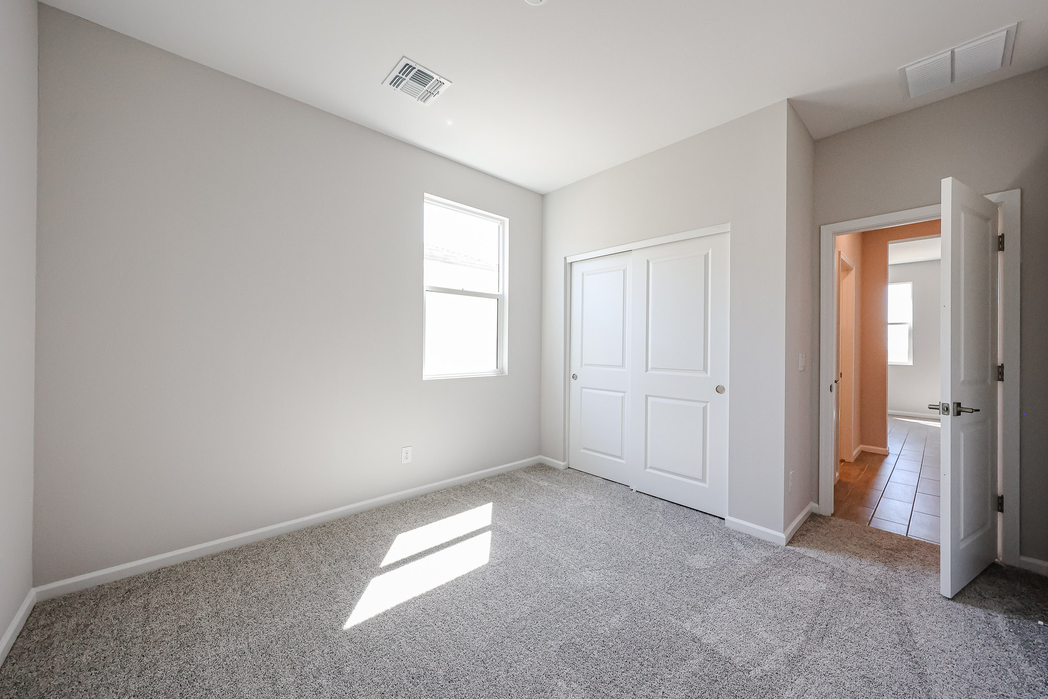 A room with white doors.