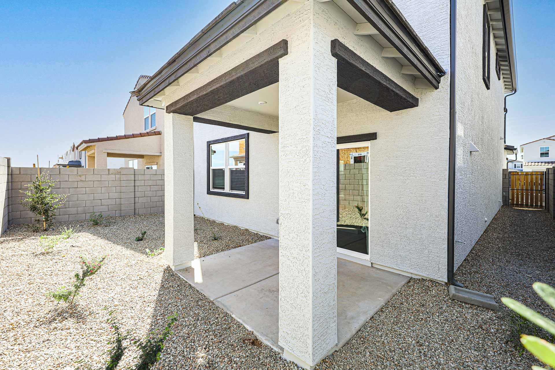 A building with a concrete patio.