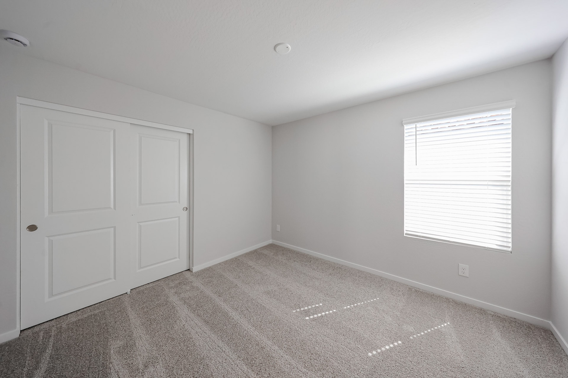 A room with white doors.