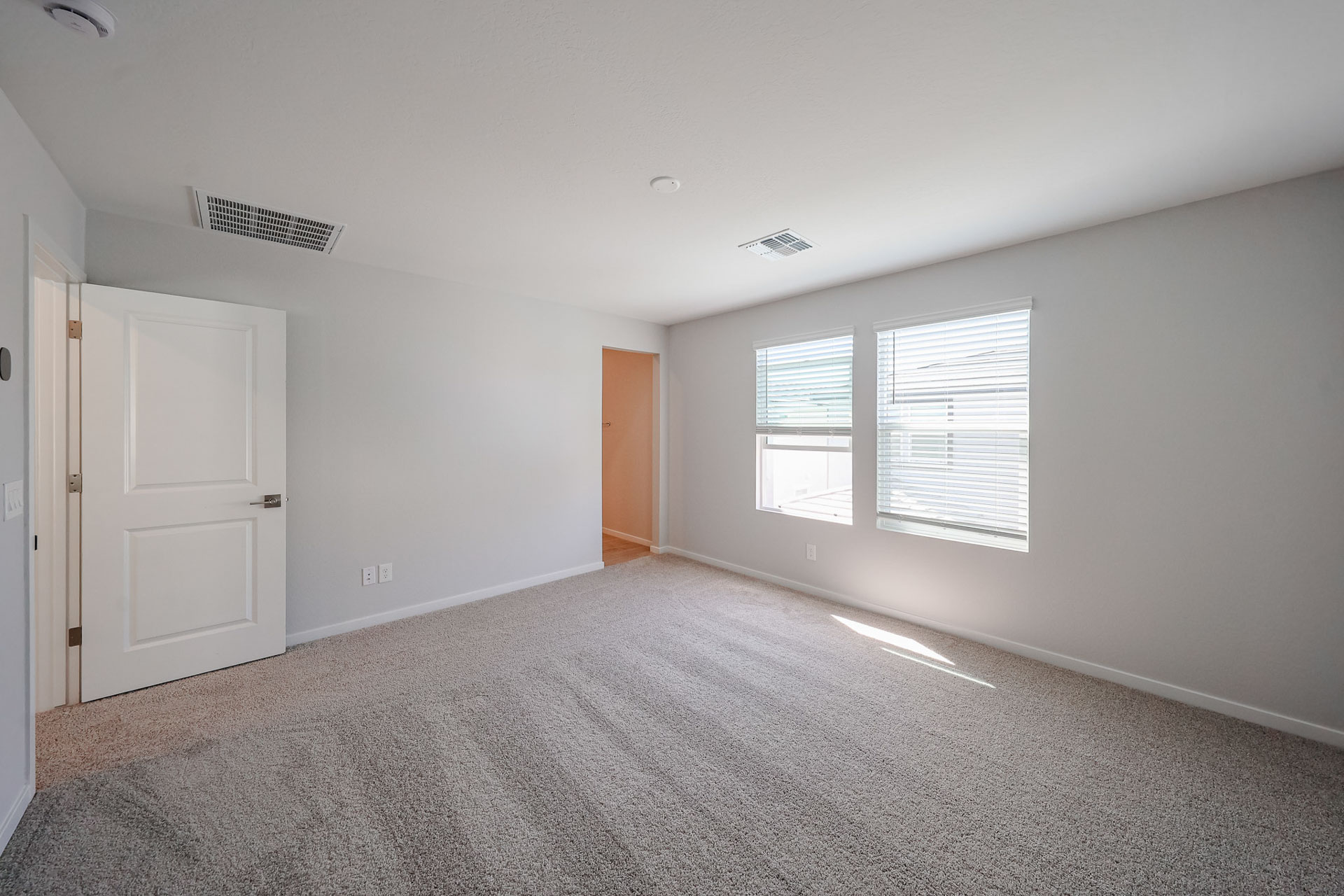 A room with white doors.