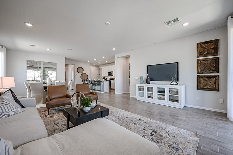A living room with a large tv.