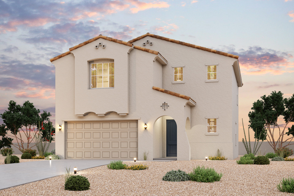 A white house with a garage.
