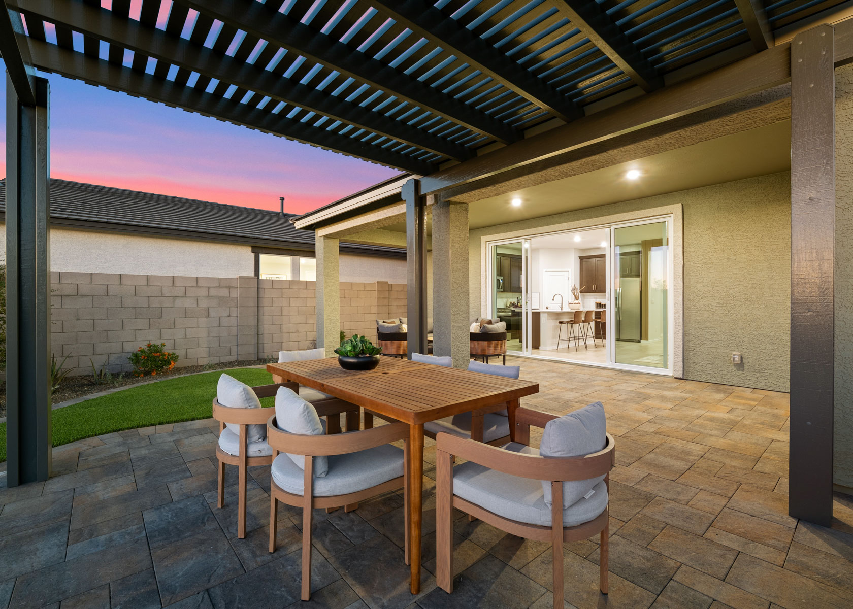 A table and chairs in a room.