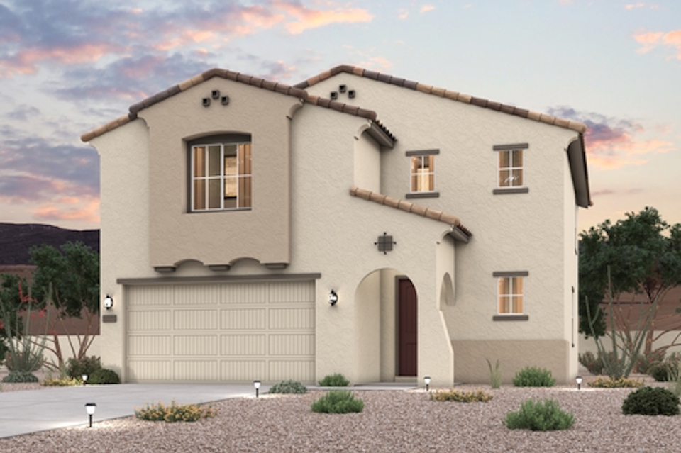 A white house with a garage.