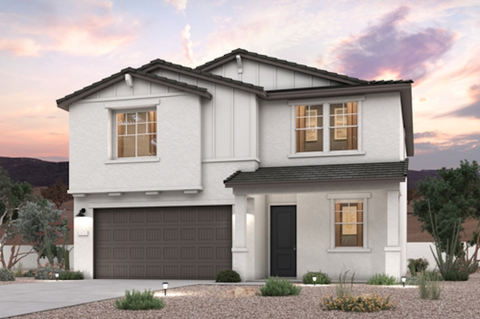 A white house with a garage.