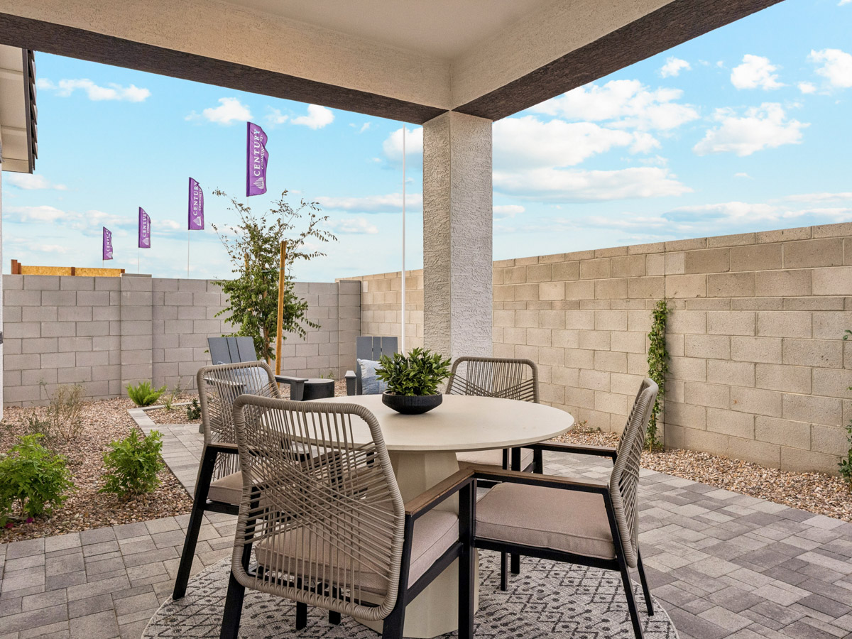 A table and chairs outside.