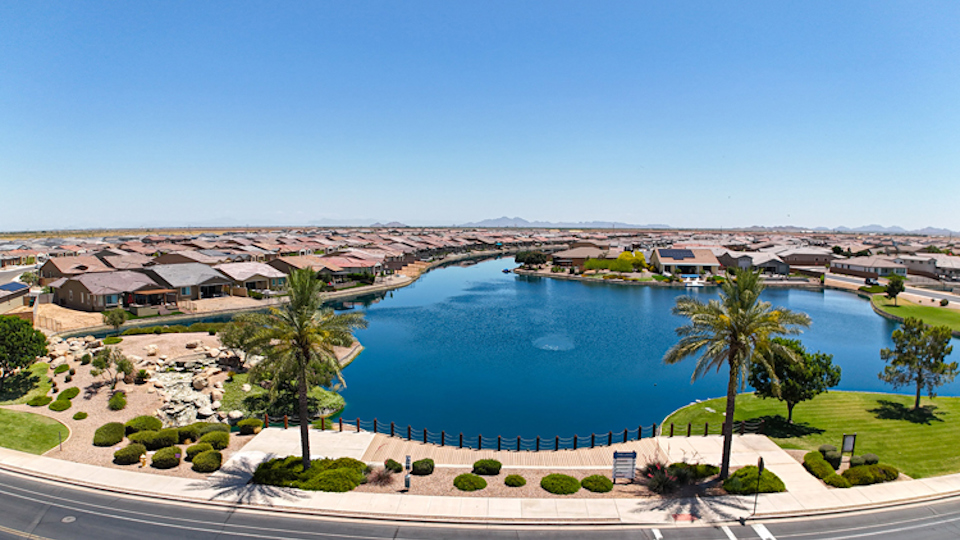 A body of water with buildings around it.
