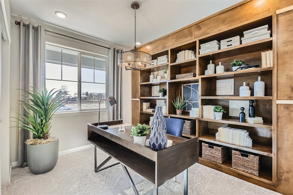 A room with shelves and a table.