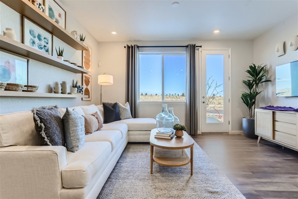 A living room with a large window.