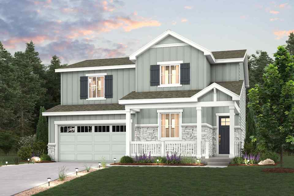 A large house with a lawn in front of it.