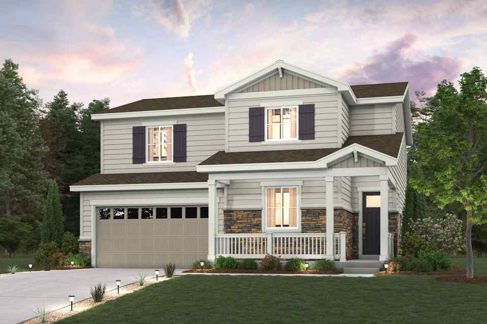A large house with a lawn in front of it.