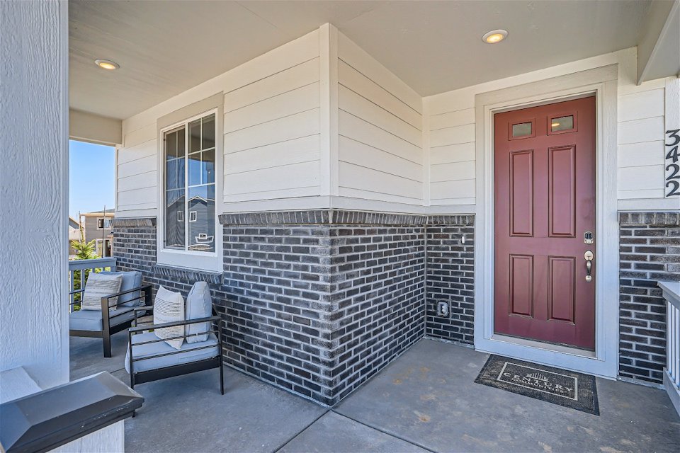 A house with a brick fireplace.