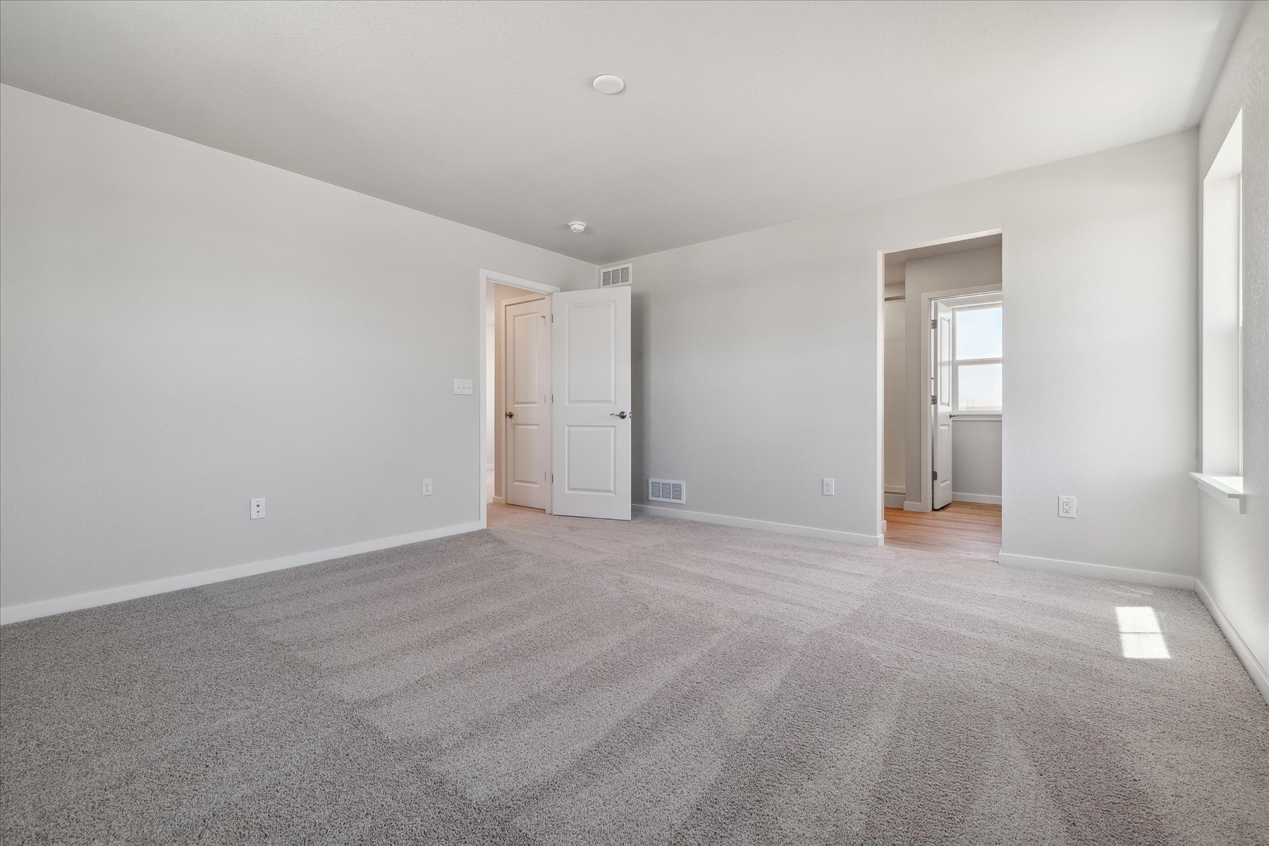 A room with white doors.