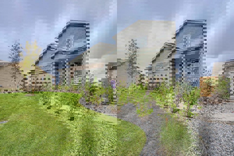A house with a garden in front.