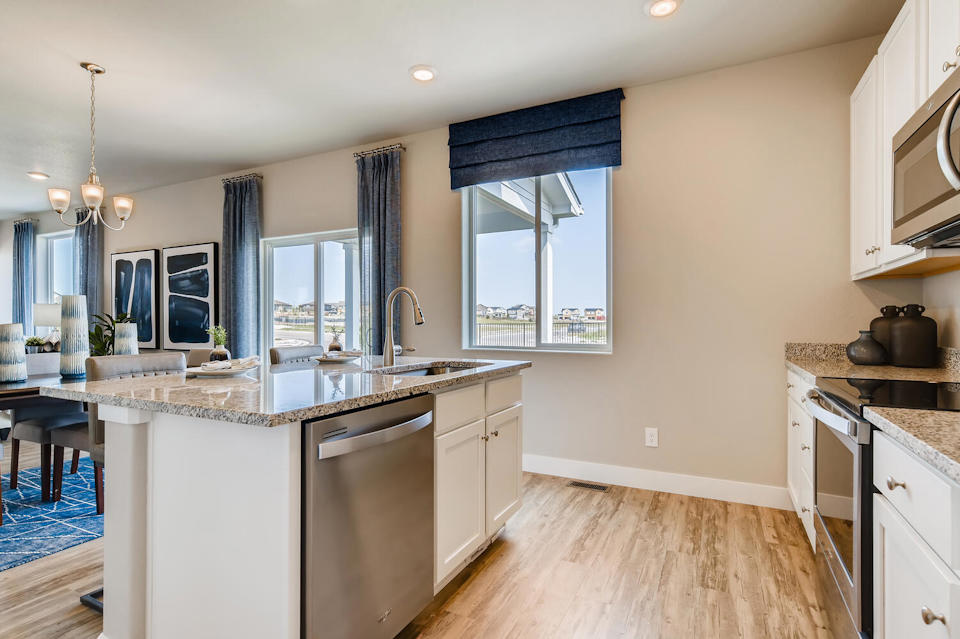 A kitchen with a large island.