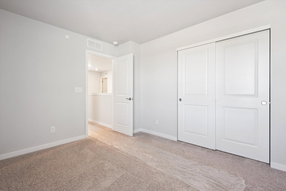 A room with white doors.