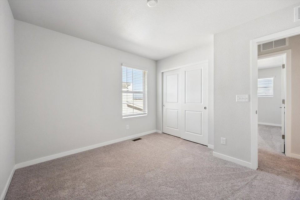 A room with white doors.