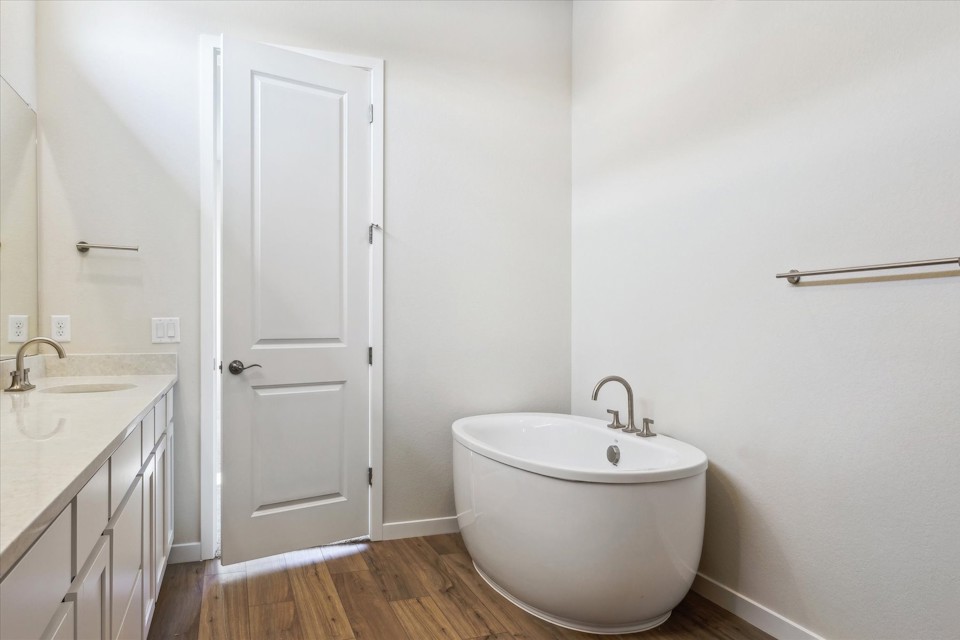 A bathroom with a sink and a toilet.