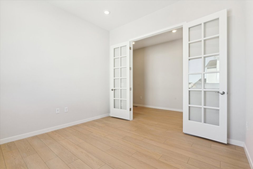 A room with white doors.