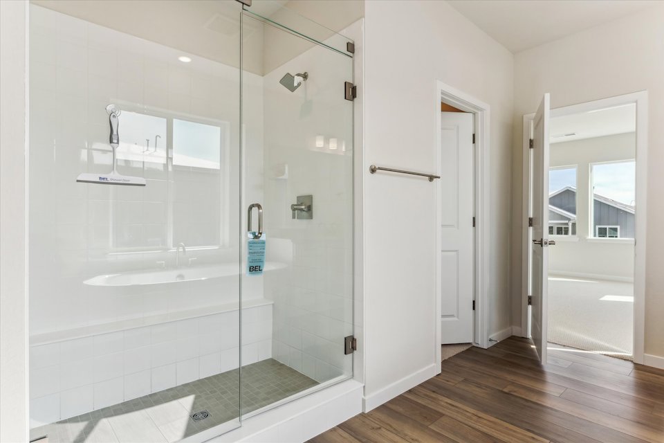 A bathroom with a glass shower.
