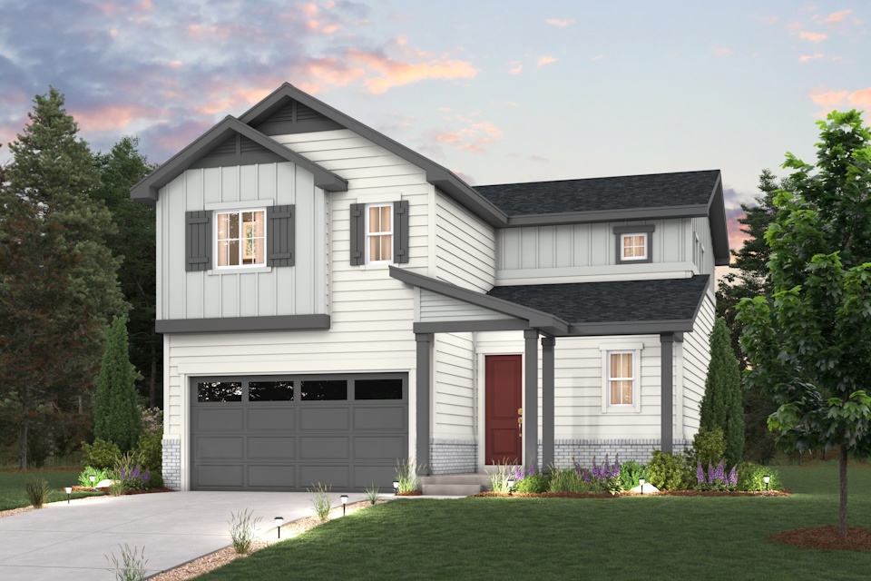 A white house with a garage.