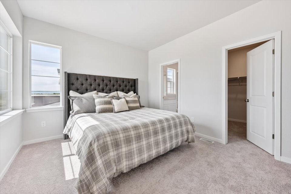 A bed in a room.