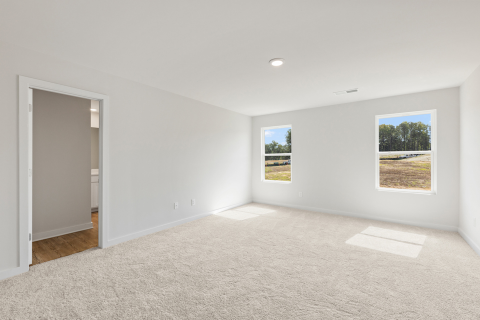 A room with a door and a window.