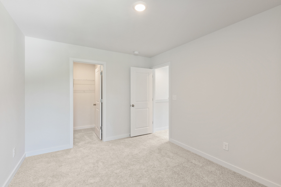 A room with white doors.