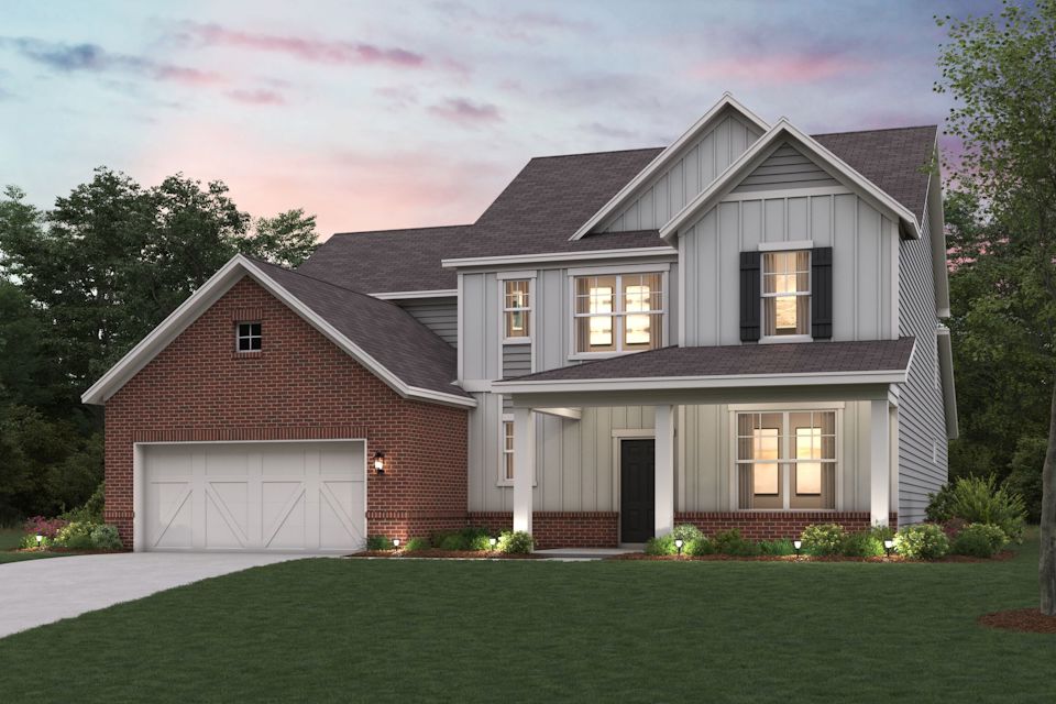 A house with a large front yard.
