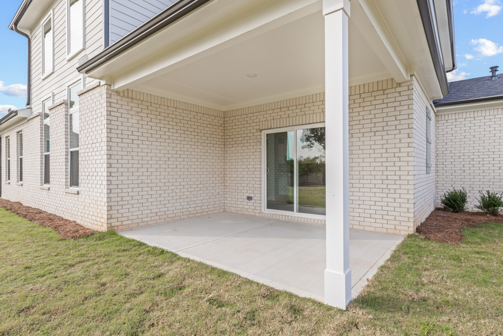 A house with a large front yard.