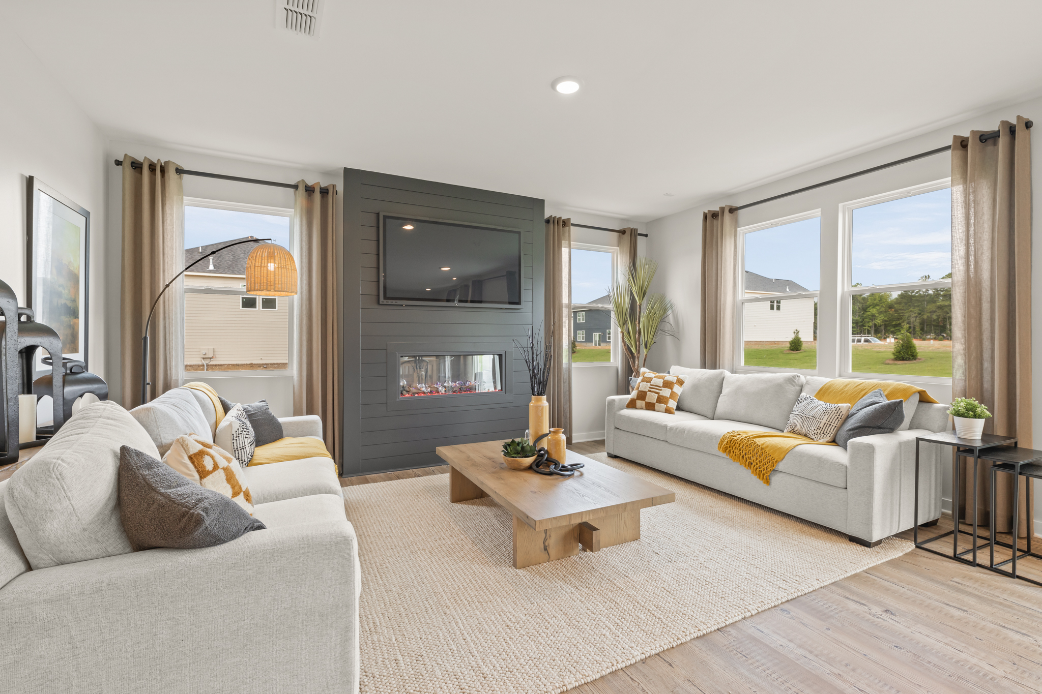 A living room with a fireplace.
