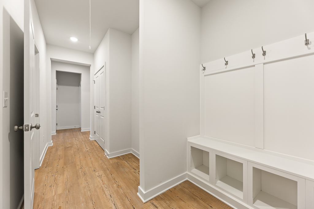 A room with white cabinets.
