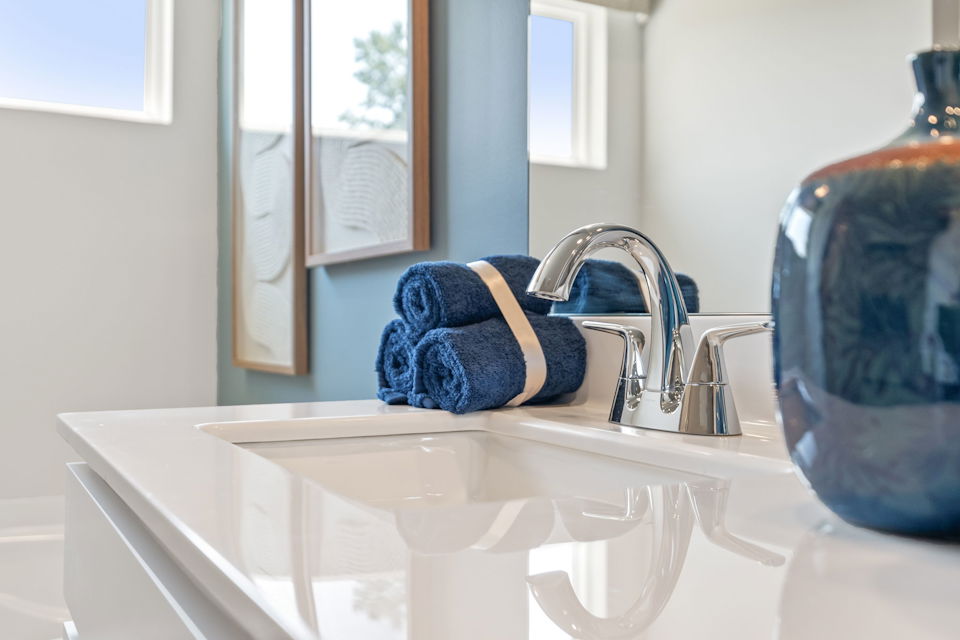 A towel on a sink.