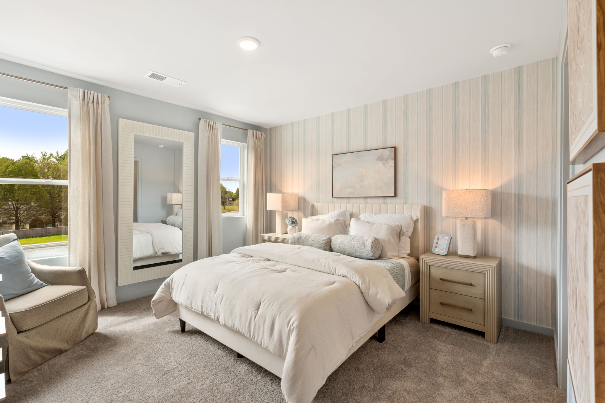 A bedroom with a large bed.