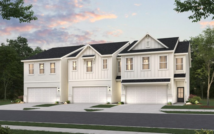 A large house with a driveway.