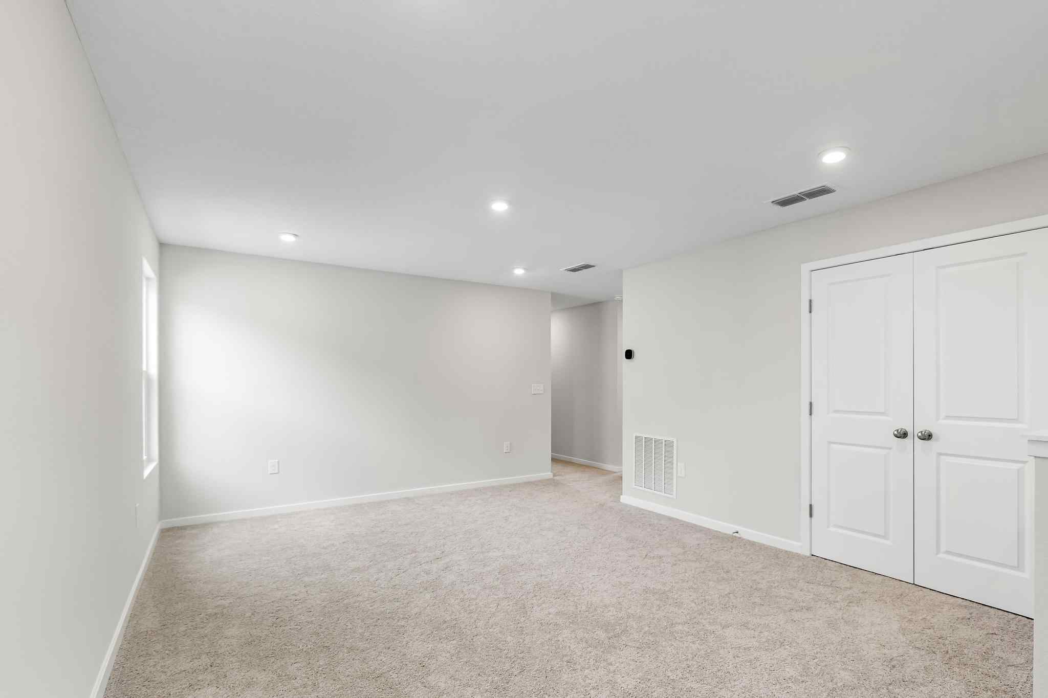 A room with white doors.