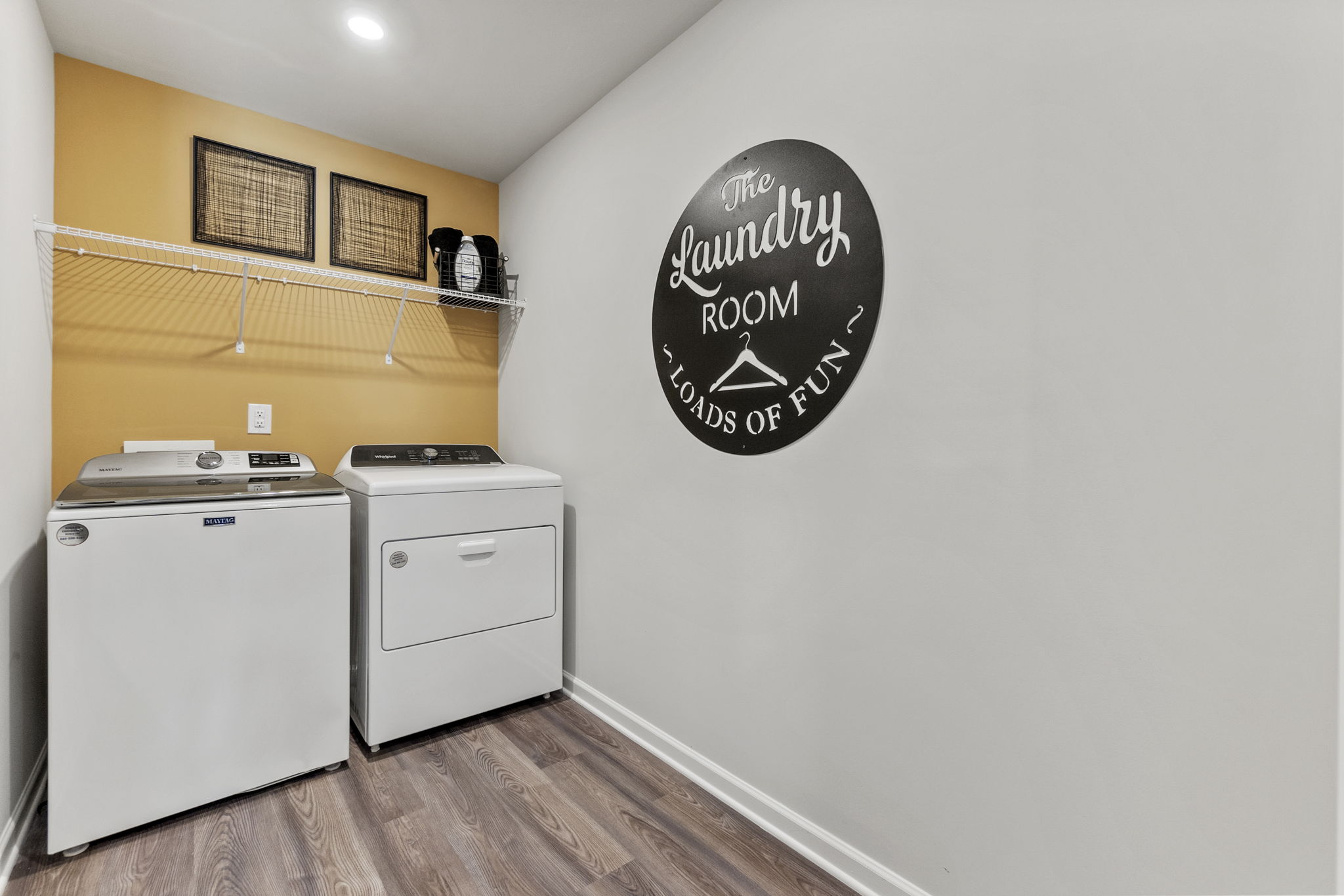 A room with a wall with a sign on it.