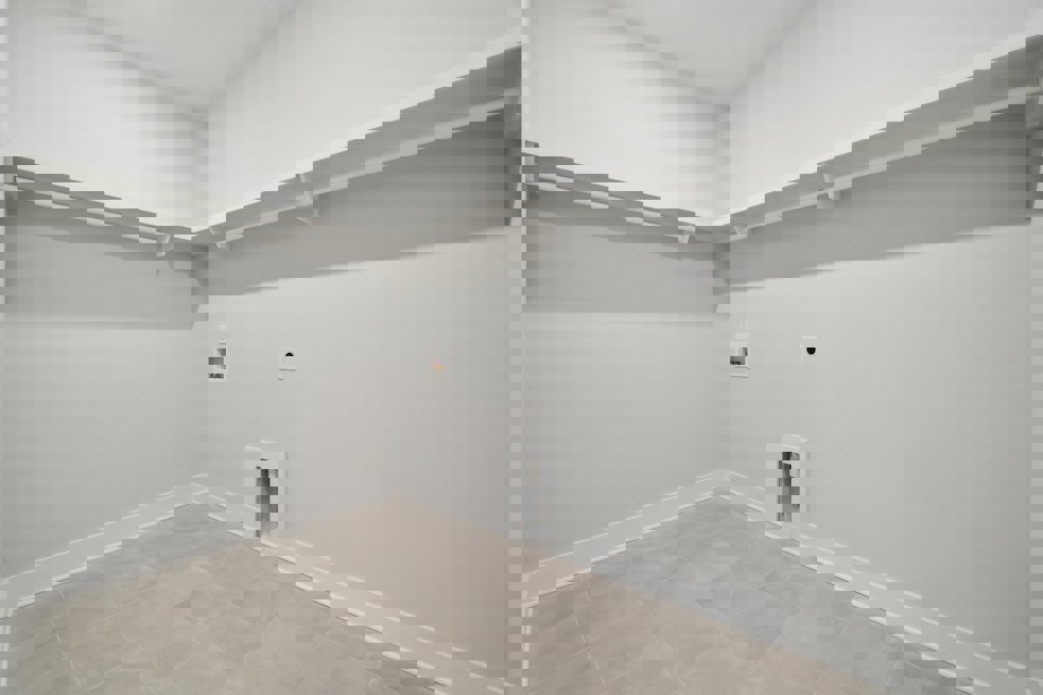A white tiled room.