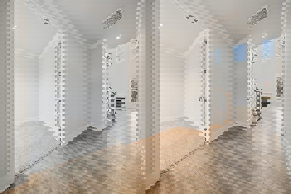 A room with a wood floor and a wood floor.