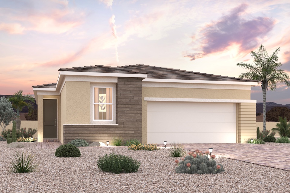 A house with a garage and trees.