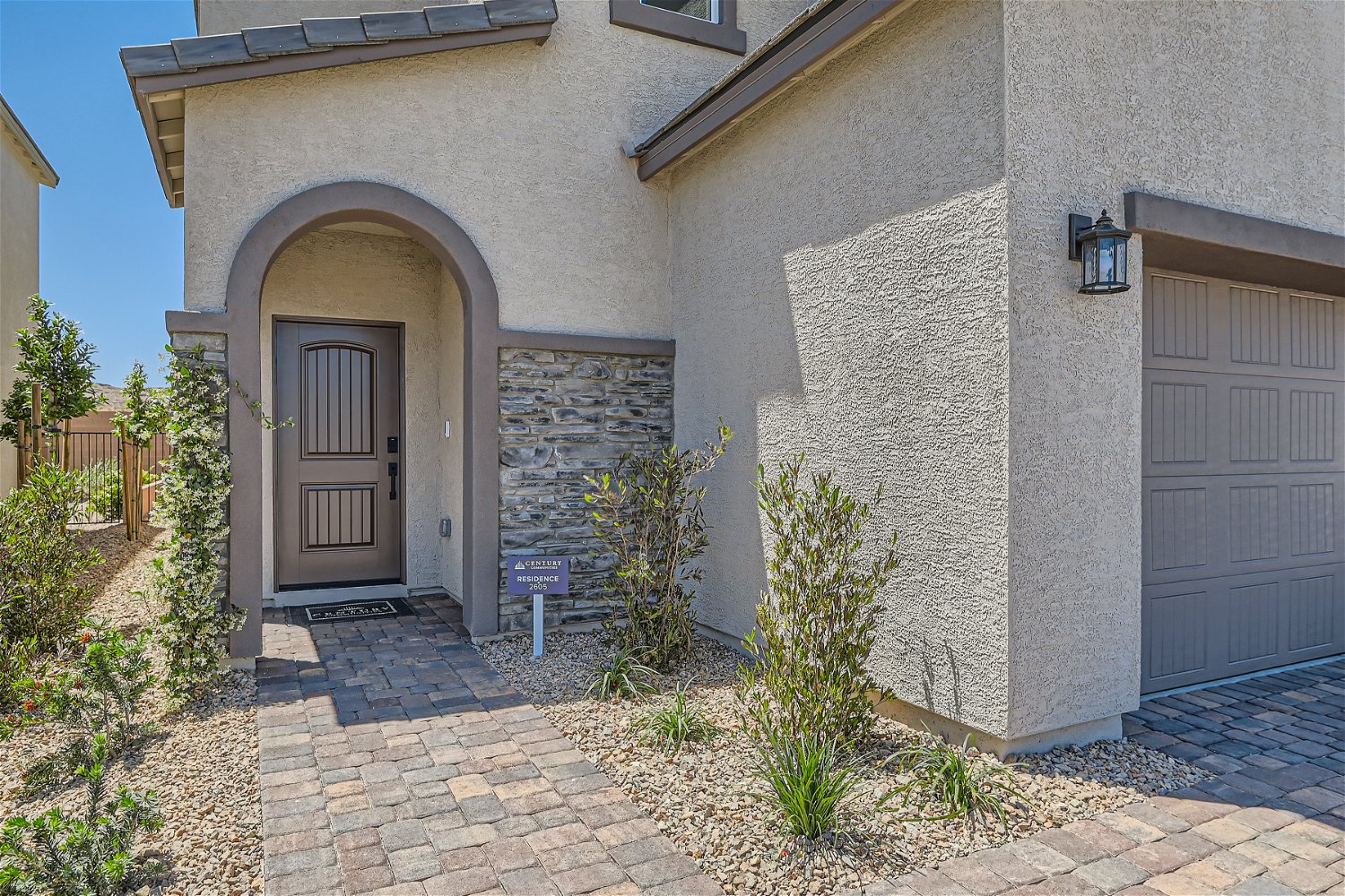 A building with a stone walkway.