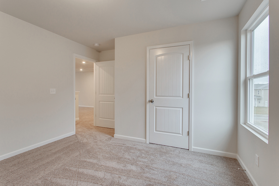 A room with white doors.