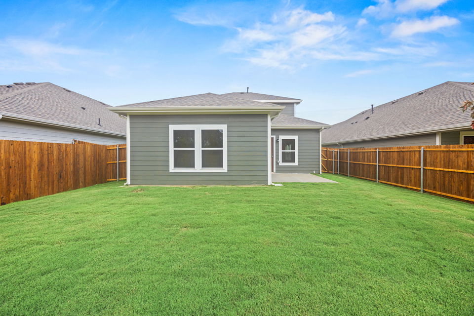 A house with a fence around it.
