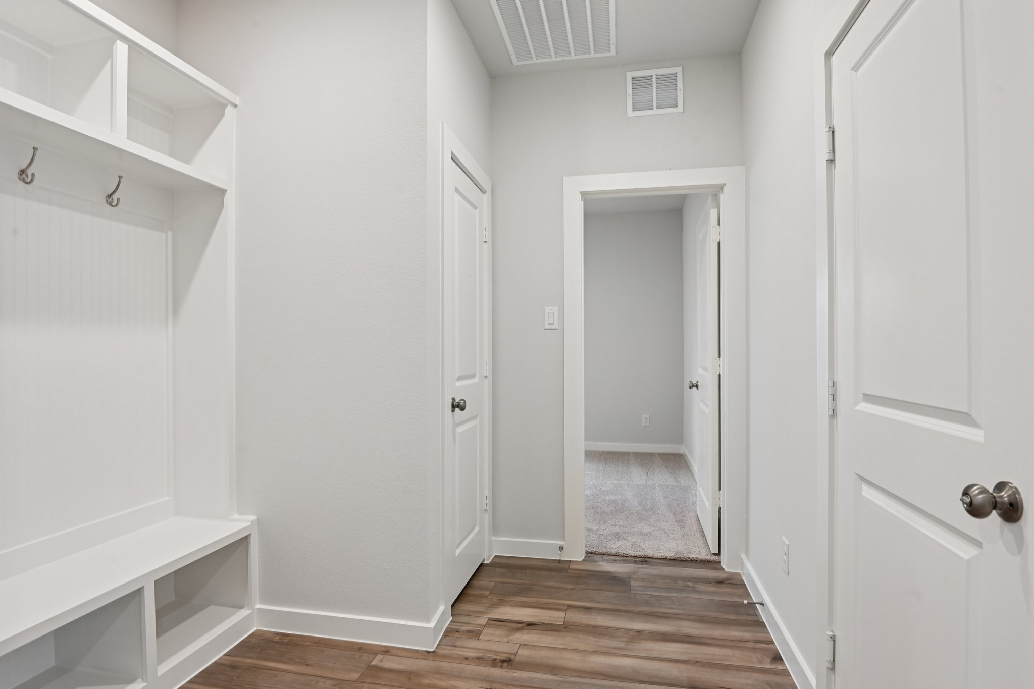 A room with white doors.