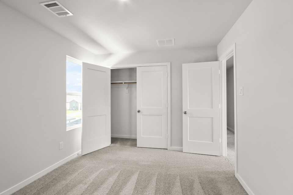 A room with white doors.